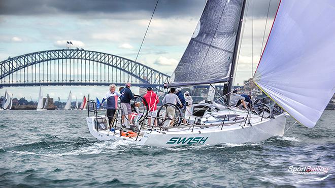 Swish crosses the Harbour Bridge en route to Kirrbilli Mark in Race 4 of the CYCA Winter Series last Sunday. © Beth Morley - Sport Sailing Photography http://www.sportsailingphotography.com